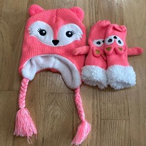 Pink fox hat and gloves no tags never used. One size fits all kid
